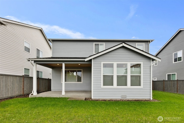 12619 176th St E, Puyallup, WA 98374 - back of house featuring a fenced backyard and a patio area