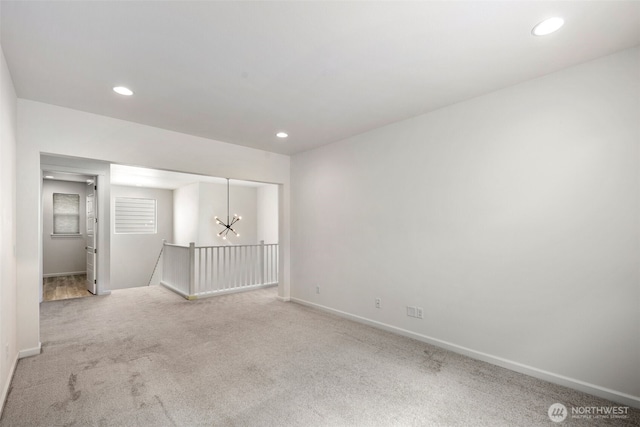 12619 176th St E, Puyallup, WA 98374 - unfurnished room with carpet floors, recessed lighting, and a chandelier
