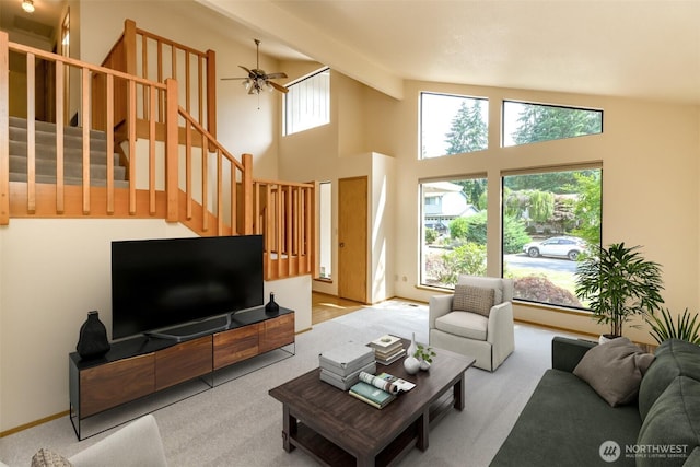 16410 92nd Ave E, Puyallup, WA 98375 - living room with stairway, a ceiling fan, carpet, high vaulted ceiling, and beam ceiling