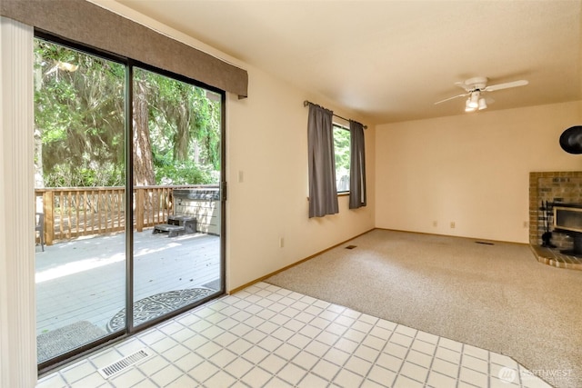 16410 92nd Ave E, Puyallup, WA 98375 - unfurnished living room featuring plenty of natural light, ceiling fan, and light carpet
