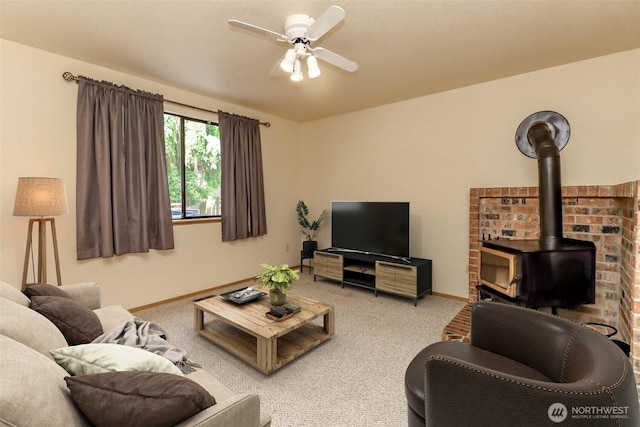 16410 92nd Ave E, Puyallup, WA 98375 - carpeted living area featuring a wood stove and ceiling fan
