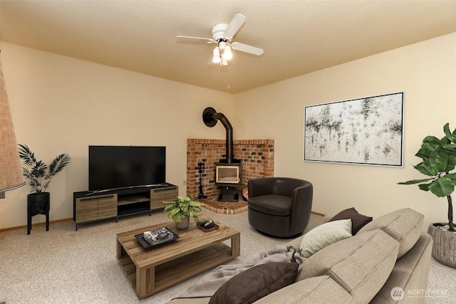 16410 92nd Ave E, Puyallup, WA 98375 - living room with a wood stove, carpet, and ceiling fan