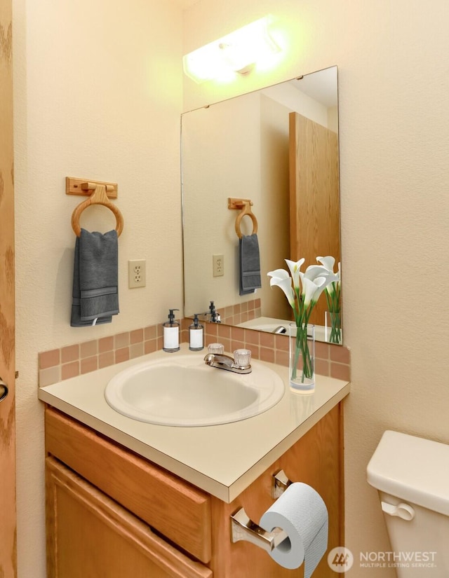 16410 92nd Ave E, Puyallup, WA 98375 - bathroom with vanity and backsplash