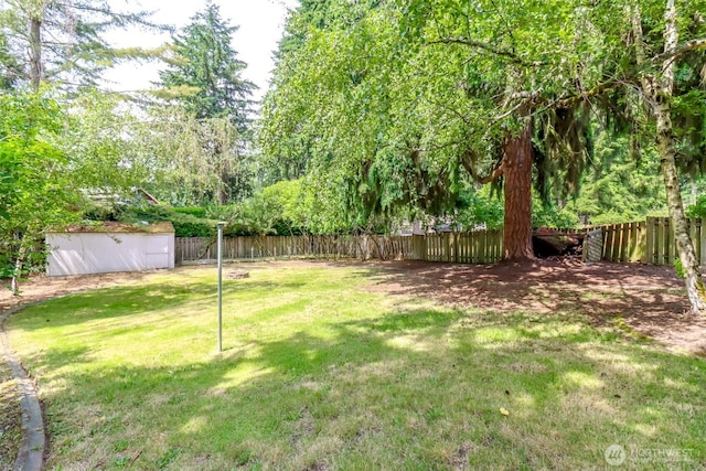16410 92nd Ave E, Puyallup, WA 98375 - fenced backyard featuring a storage shed
