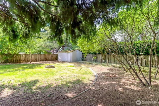 16410 92nd Ave E, Puyallup, WA 98375 - fenced backyard with an outdoor fire pit and a shed