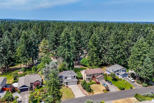 16410 92nd Ave E, Puyallup, WA 98375 - aerial perspective of suburban area featuring a heavily wooded area