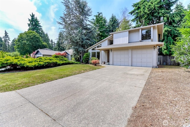 16410 92nd Ave E, Puyallup, WA 98375 - view of front of home featuring concrete driveway and a garage