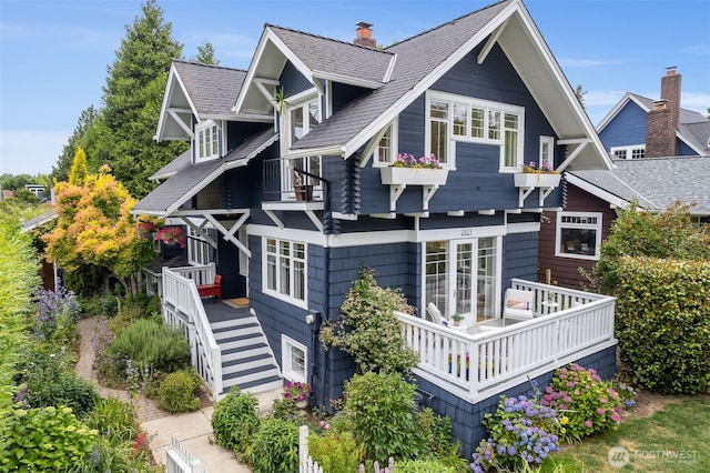 2823 34th Ave S, Seattle, WA 98144 - back of house featuring a balcony and a shingled roof