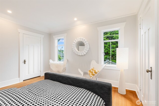 2823 34th Ave S, Seattle, WA 98144 - bedroom with light wood-style floors, ornamental molding, and recessed lighting