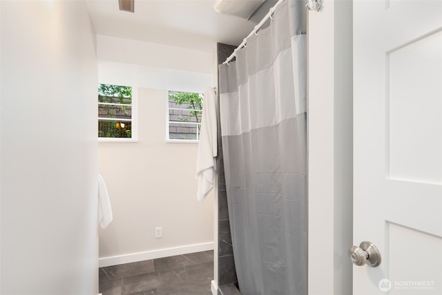 2823 34th Ave S, Seattle, WA 98144 - bathroom with curtained shower and baseboards
