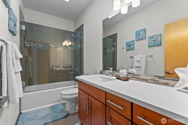 3800 SW Holden St, Seattle, WA 98126 - bathroom with vanity, bath / shower combo with glass door, and tile patterned floors