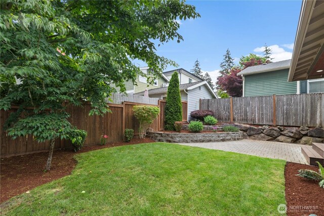 3800 SW Holden St, Seattle, WA 98126 - fenced backyard featuring a patio area