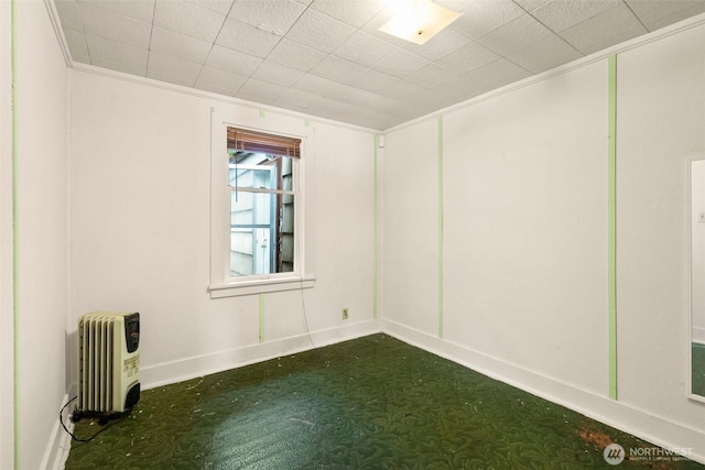 2120 E Spencer Lake Rd, Shelton, WA 98584 - unfurnished room with radiator heating unit, dark colored carpet, and crown molding