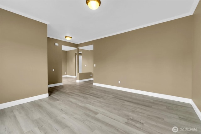 18527 97th Ave E, Puyallup, WA 98375 - spare room with ornamental molding and wood finished floors
