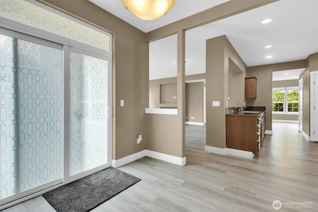 18527 97th Ave E, Puyallup, WA 98375 - doorway with light wood-type flooring and recessed lighting