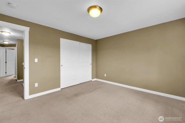 18527 97th Ave E, Puyallup, WA 98375 - unfurnished bedroom featuring carpet floors and a closet