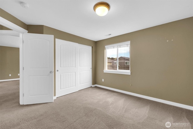 18527 97th Ave E, Puyallup, WA 98375 - unfurnished bedroom featuring carpet and a closet