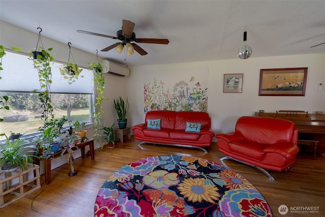 1328 Grant St, Walla Walla, WA 99362 - living room featuring an AC wall unit, wood finished floors, and a ceiling fan