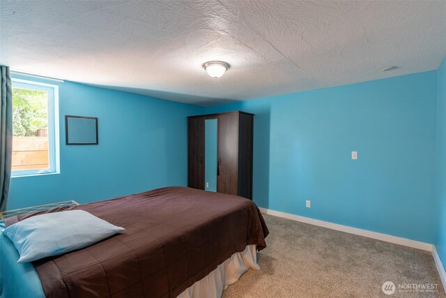 1328 Grant St, Walla Walla, WA 99362 - bedroom featuring carpet and a textured ceiling