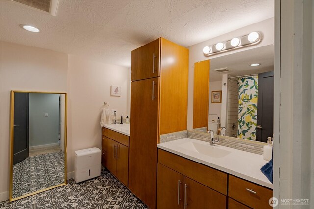 1328 Grant St, Walla Walla, WA 99362 - full bath with vanity and a textured ceiling