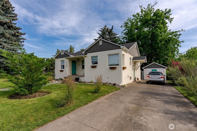 1328 Grant St, Walla Walla, WA 99362 - ranch-style house with a front lawn, driveway, and concrete block siding