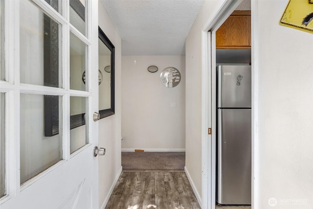 1401 Lum Rd, Centralia, WA 98531 - hallway with wood finished floors and a textured ceiling