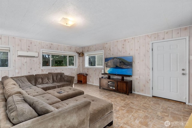 1401 Lum Rd, Centralia, WA 98531 - living room with wooden walls, a wall unit AC, and stone finish floors
