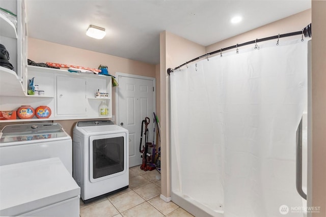 1401 Lum Rd, Centralia, WA 98531 - laundry room featuring washing machine and clothes dryer and light tile patterned floors