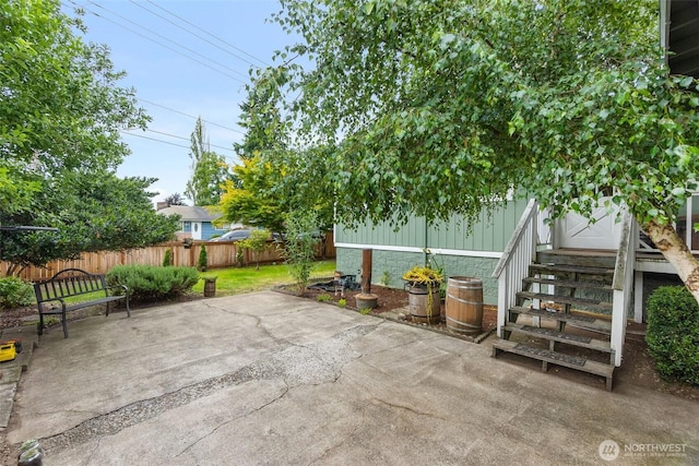 1401 Lum Rd, Centralia, WA 98531 - fenced backyard with a patio area and entry steps