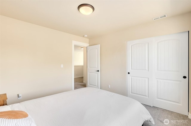 1803 65th Ct SE, Tumwater, WA 98501 - bedroom with light carpet and a closet