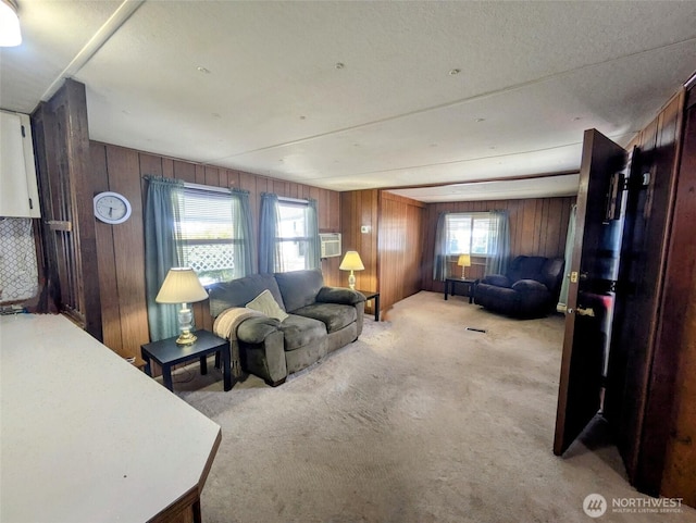 2302 R St SE Unit 108, Auburn, WA 98002 - living area with wood walls and light carpet