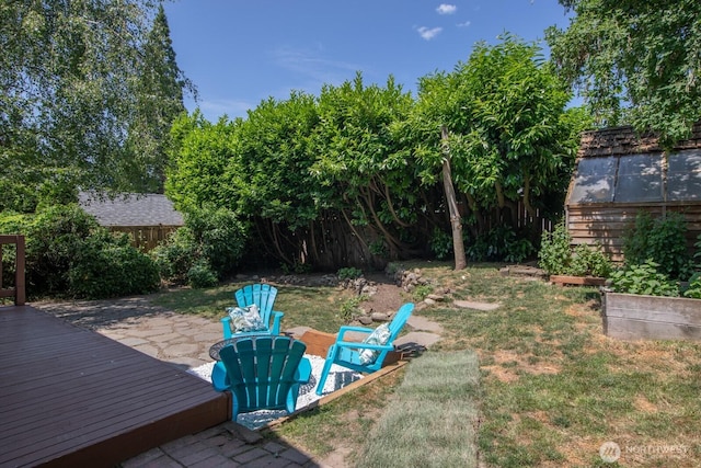 2110 N 88th St, Seattle, WA 98103 - fenced backyard featuring a wooden deck and a patio