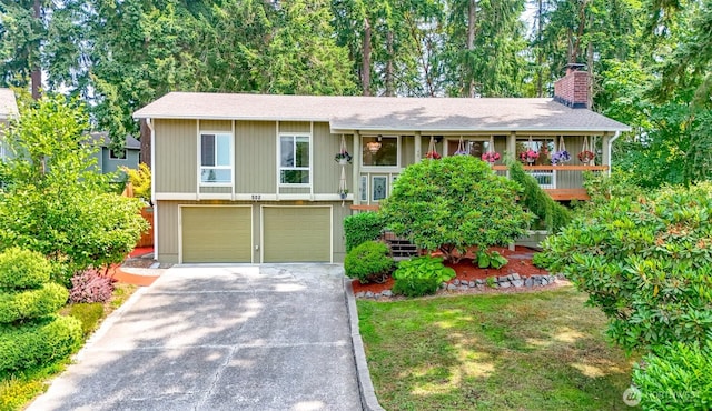 502 SW 326th St, Federal Way, WA 98023 - raised ranch with driveway, an attached garage, a chimney, and roof with shingles