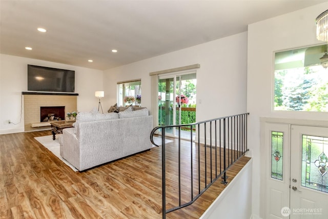 502 SW 326th St, Federal Way, WA 98023 - living area featuring wood finished floors, recessed lighting, and a fireplace
