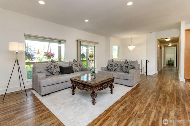 502 SW 326th St, Federal Way, WA 98023 - living room featuring wood finished floors, a chandelier, and recessed lighting