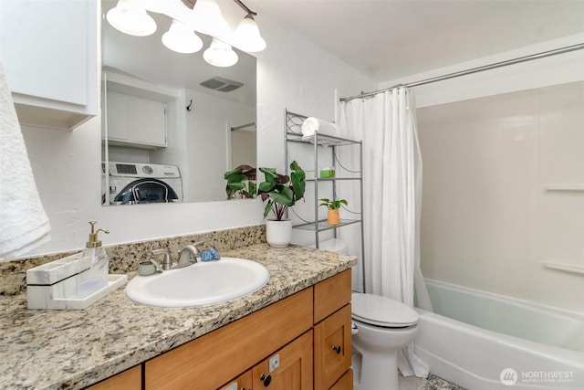 502 SW 326th St, Federal Way, WA 98023 - bathroom featuring washer / dryer, vanity, and shower / bath combination with curtain