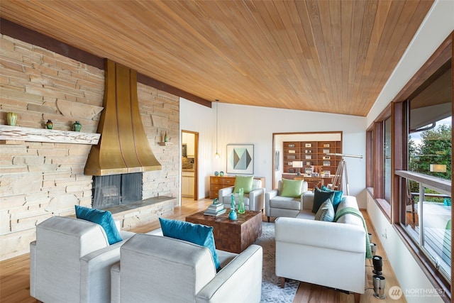 432 SW 206th St, Normandy Park, WA 98166 - living area with wood ceiling, lofted ceiling, a fireplace, and wood finished floors