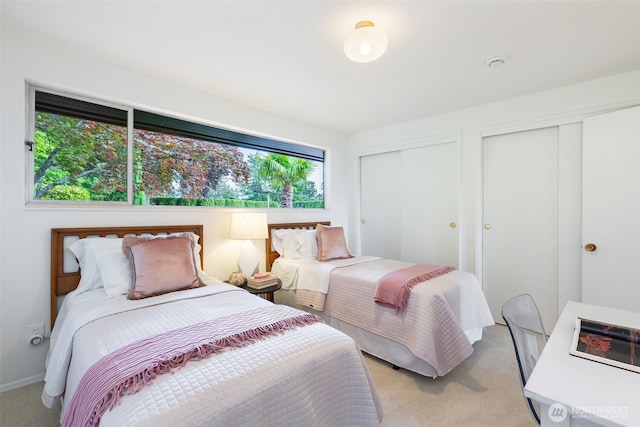 432 SW 206th St, Normandy Park, WA 98166 - bedroom featuring two closets and light colored carpet