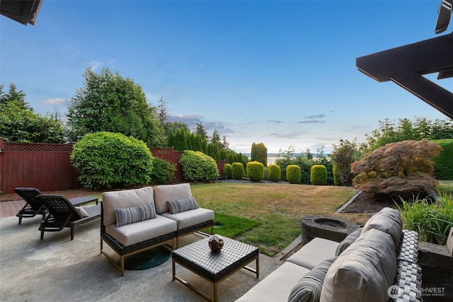 432 SW 206th St, Normandy Park, WA 98166 - fenced backyard featuring an outdoor living space with a fire pit and a patio area