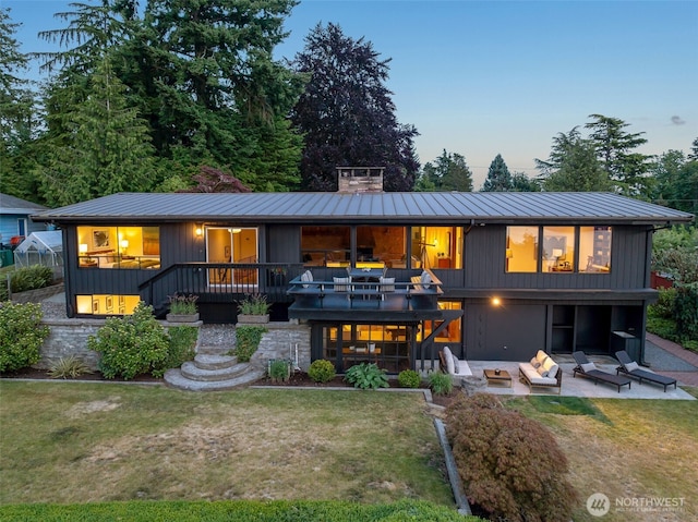 432 SW 206th St, Normandy Park, WA 98166 - rear view of property with a standing seam roof, a patio area, and a yard
