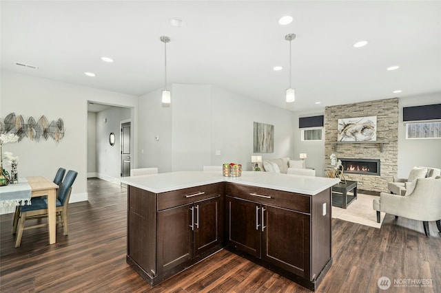 18405 15th Ave W, Lynnwood, WA 98037 - kitchen featuring dark wood-style flooring, light countertops, open floor plan, and recessed lighting