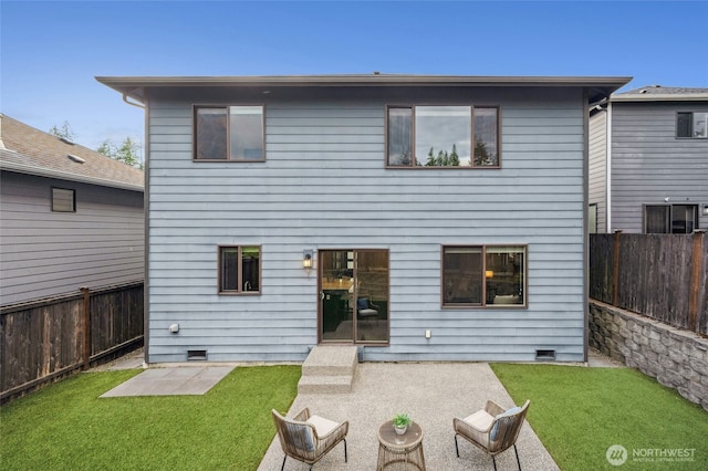 18405 15th Ave W, Lynnwood, WA 98037 - rear view of property with a fenced backyard, crawl space, and a patio area