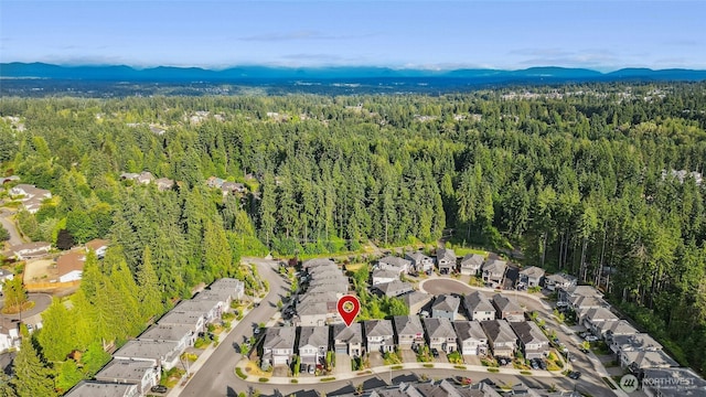 18405 15th Ave W, Lynnwood, WA 98037 - aerial view of property and surrounding area featuring mountains and nearby suburban area