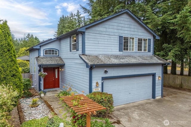 5626 29th Ct SE, Lacey, WA 98503 - traditional-style home featuring a garage, driveway, and roof with shingles