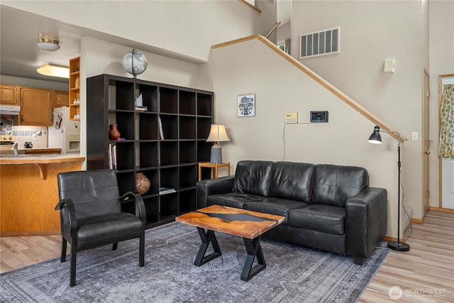 5626 29th Ct SE, Lacey, WA 98503 - living area with light wood-style floors and baseboards