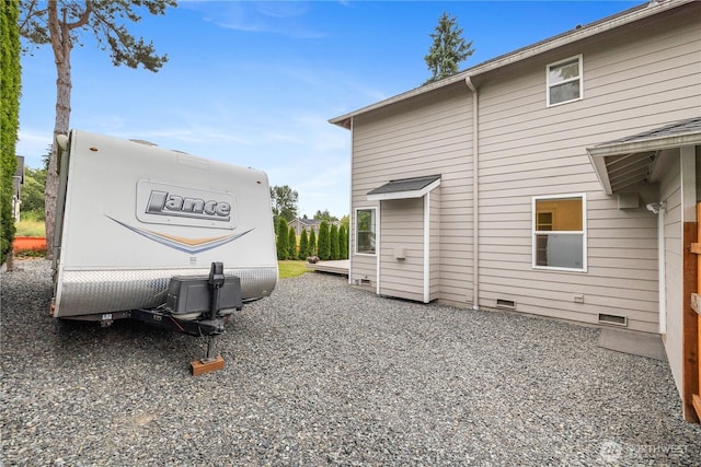 21206 9th Ave SE, Bothell, WA 98021 - rear view of house with crawl space