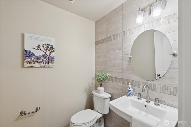 21206 9th Ave SE, Bothell, WA 98021 - bathroom featuring tile walls and tasteful backsplash