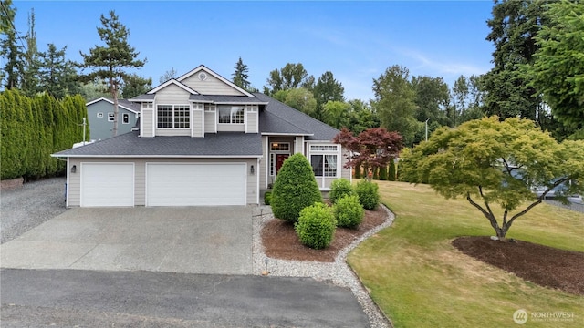 21206 9th Ave SE, Bothell, WA 98021 - view of front of home with driveway, a garage, a front lawn, a shingled roof, and view of scattered trees