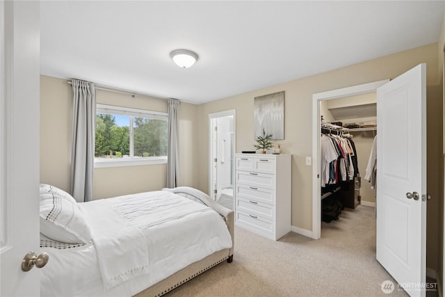 21206 9th Ave SE, Bothell, WA 98021 - bedroom with a spacious closet, light carpet, and a closet
