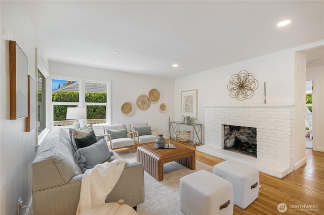 13247 2nd Ave NW, Seattle, WA 98177 - living room featuring healthy amount of natural light, a fireplace, light wood-style floors, and recessed lighting